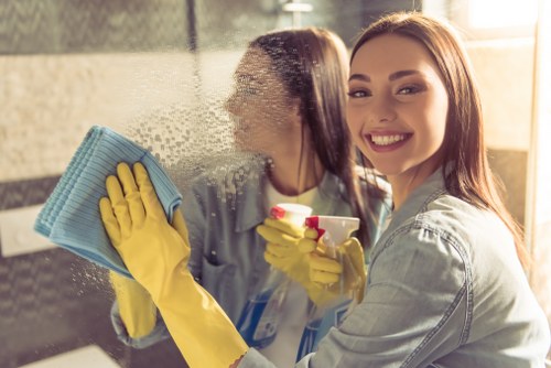 Local oven cleaner working in a Balham flat kitchen